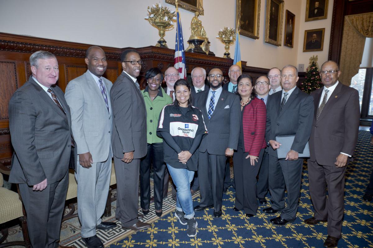 Council members join Mayor Jim Kenney (left) business owner Monica Parrilla (center), Community College of Philadelphia President Donald Guy Generals, (2nd left) and city Commerce Director Harold Epps (far right) to announce the launch of Power Up Your Business.