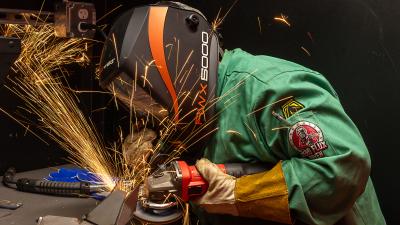 Student welding in the lab at the CATC.