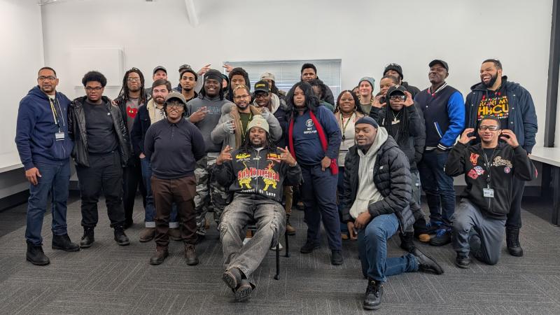 Students in the naval wlding and non-destructive technician programs posing in a group for a photo 