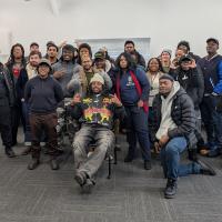 Students in the naval wlding and non-destructive technician programs posing in a group for a photo 