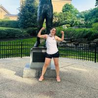 Adriana posing in front of the rockie statue