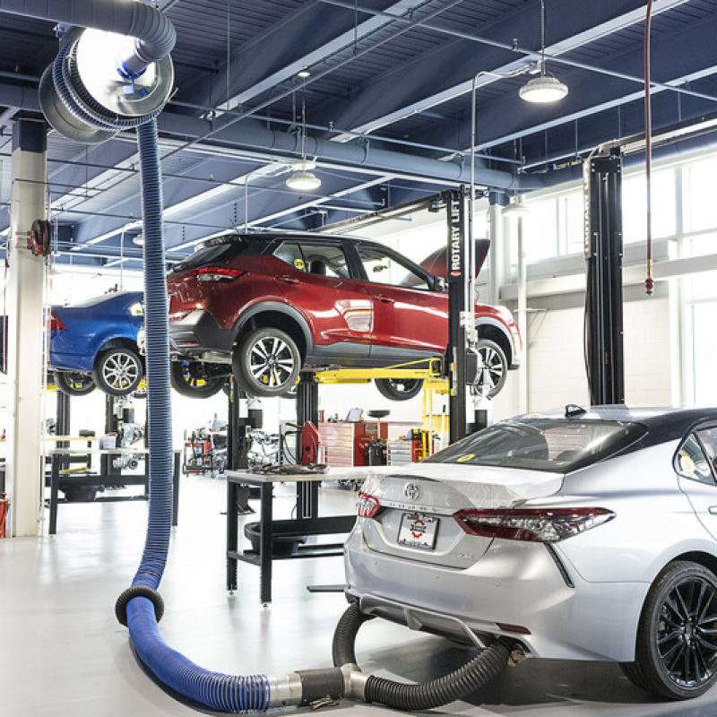 Cars in an automotive service bay