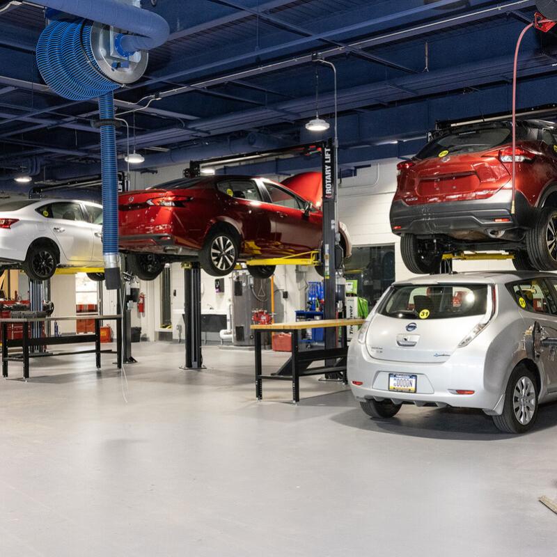 Cars in an automotive service bay