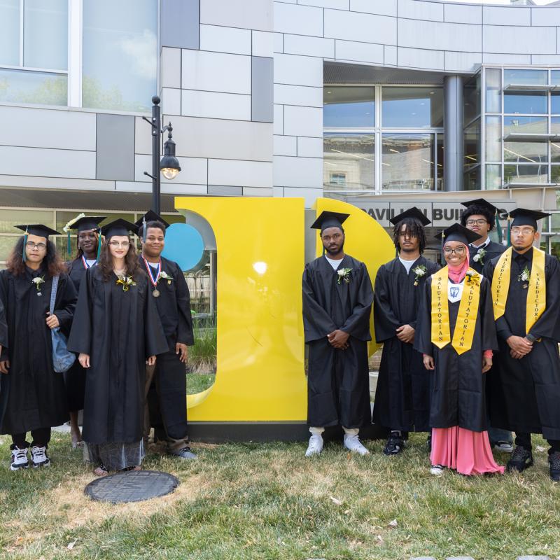 Gateway to College students posing for a photo after their graduation ceremony