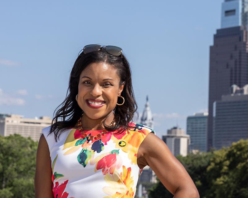 Dr Marshall in front of the Philadelphia skyline