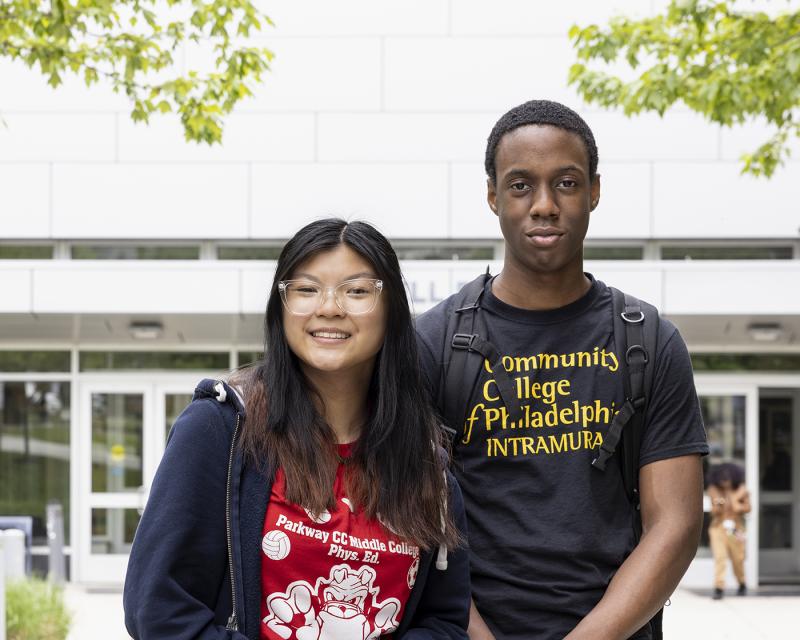 Two high school students smiling outside of the Bonnell Building