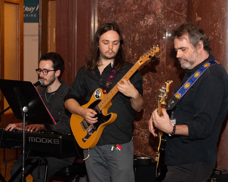 People playing guitar