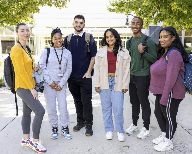 group of students standing outside of the Bonnell Building