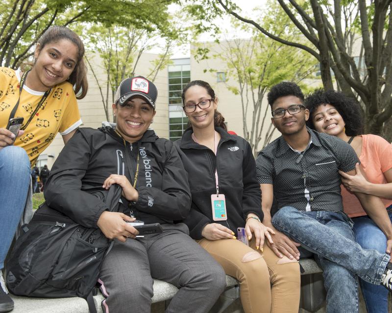 Students Smiling at the Camera on Campus