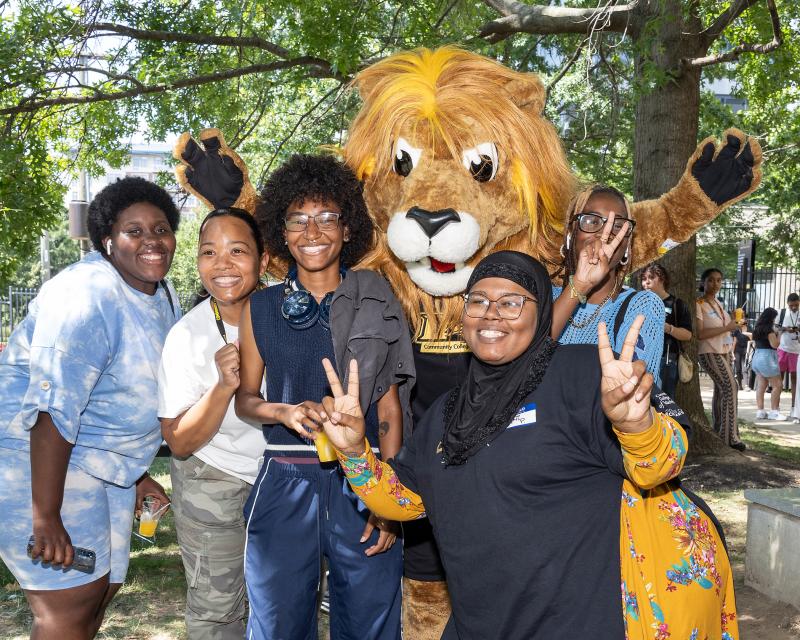 Roary with students smiling