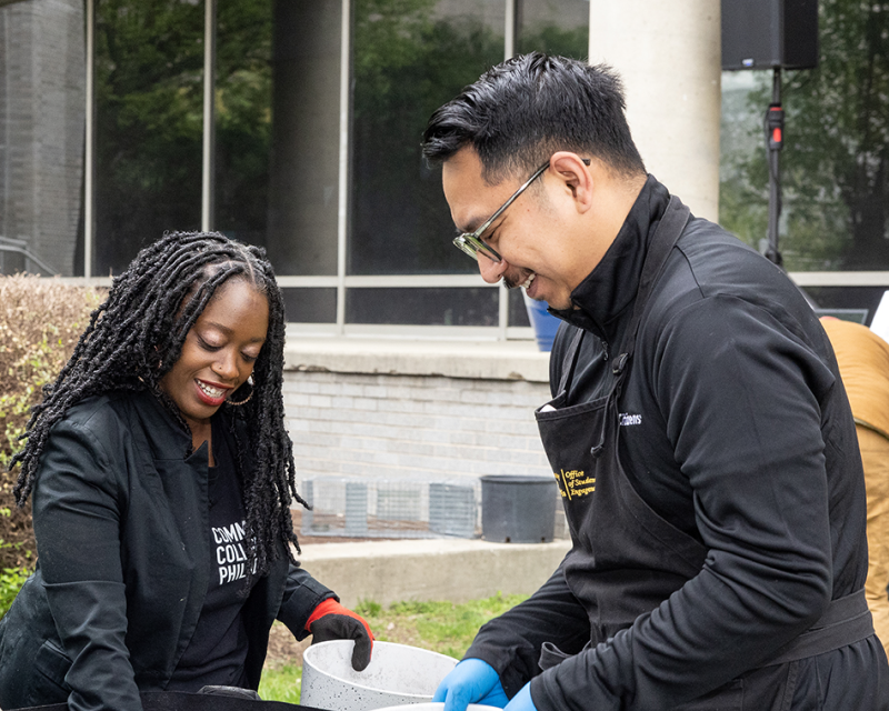 students working in a garden