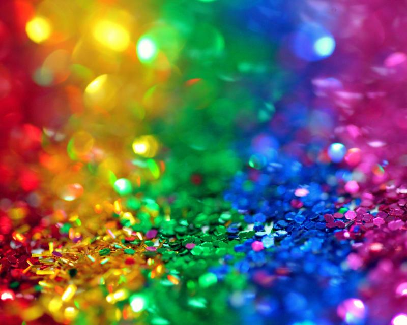 Sparkles in the colors of the rainbow flag
