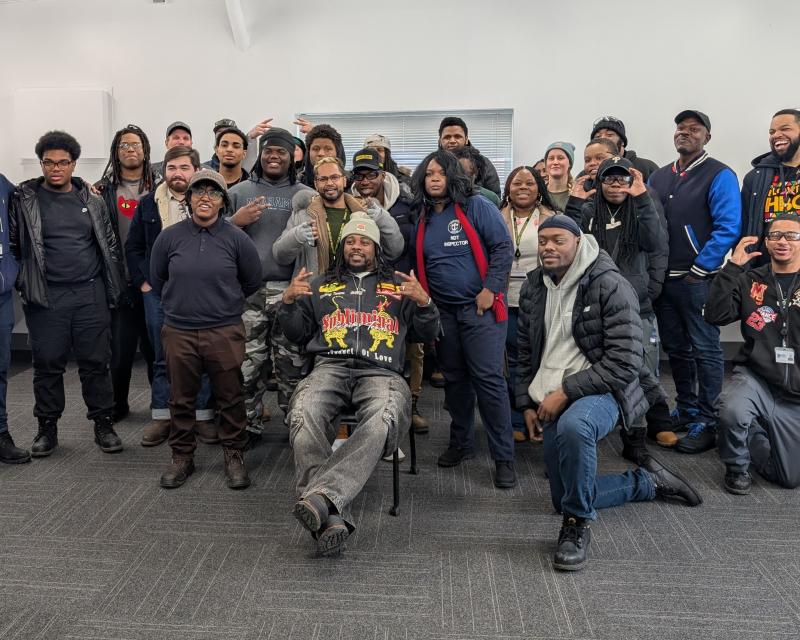 Students in the naval wlding and non-destructive technician programs posing in a group for a photo 