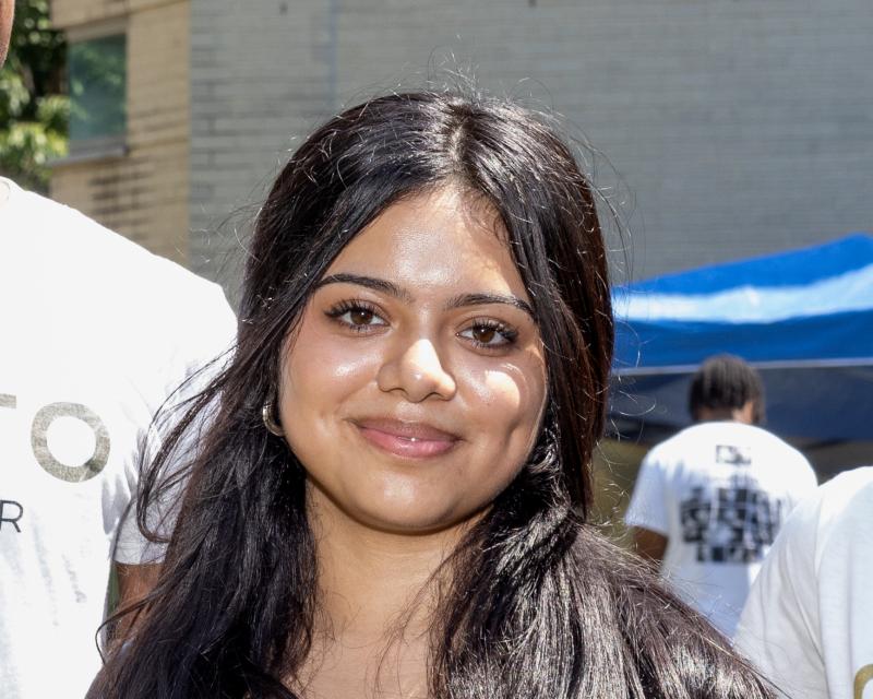 Angie smiling at the camera