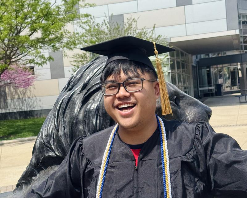 Debt free student david hansen smiling