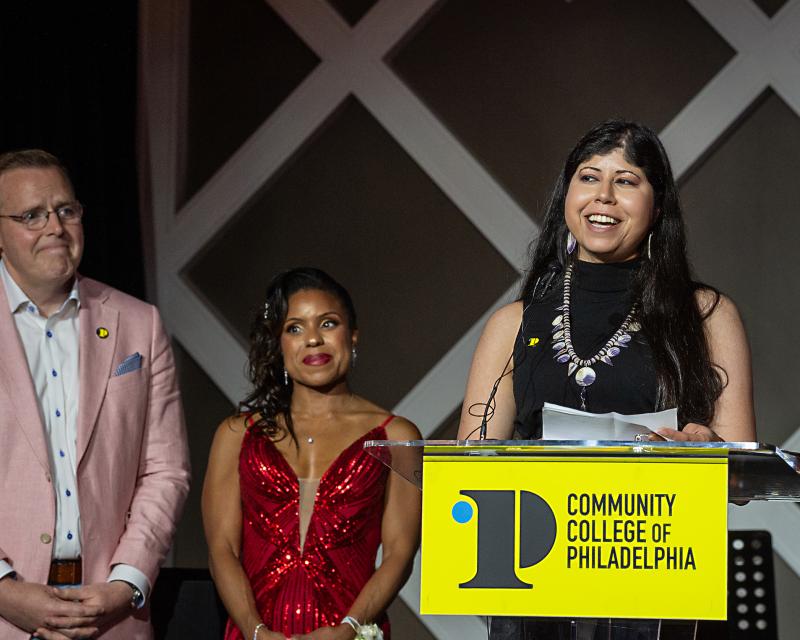 Fatima giving a speech at the Black and Gold Gala