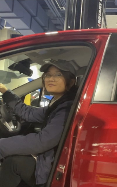 Tatyana in an auto shop